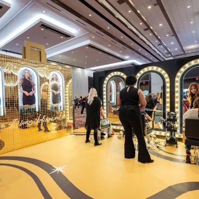 Fans get styled at the TRESemm&eacute; glam stations lined with light-up mirrors